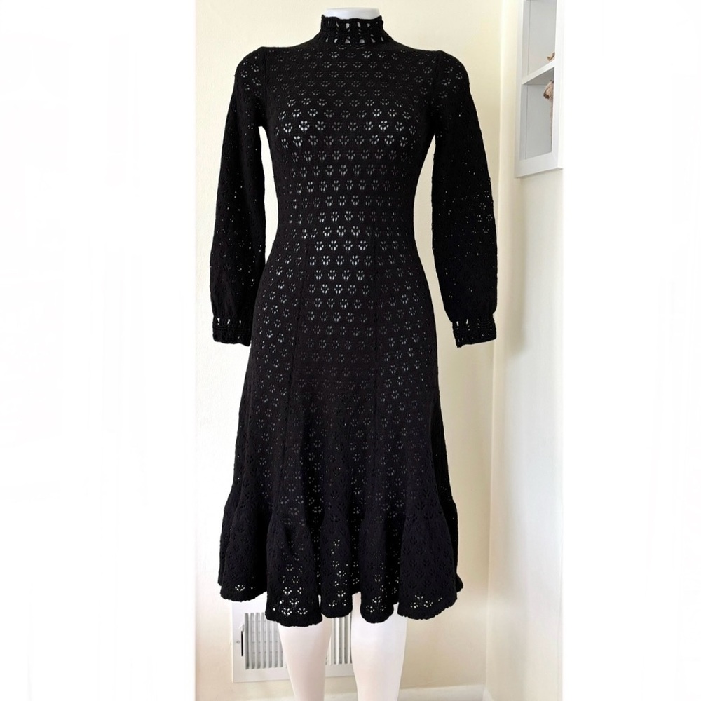 1970s black crochet knit high neck dress with bishop long sleeves ruffle skirt